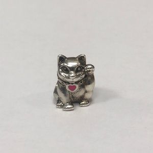 Discontinued Pandora Cat-Charm with pink heart.